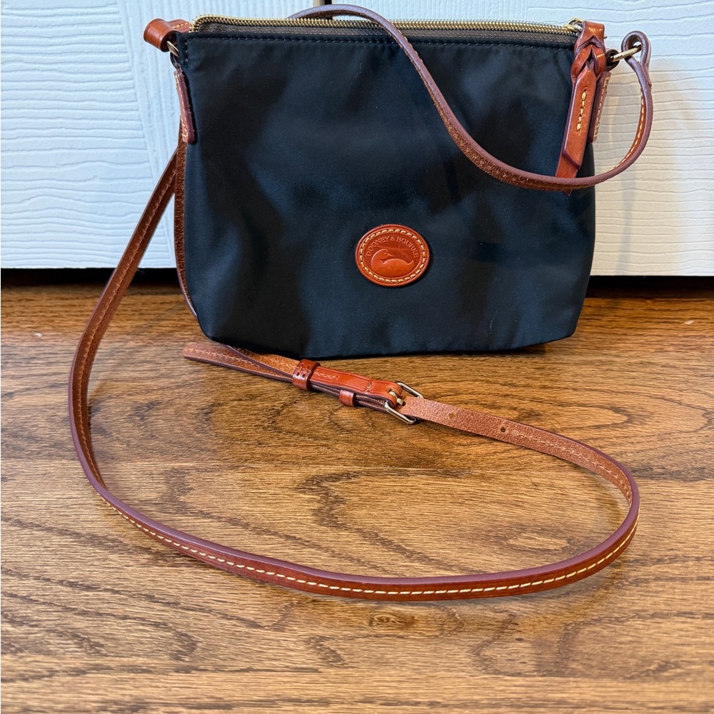Dooney and Bourke nylone Black Crossbody Bag with Brown Leather Strap